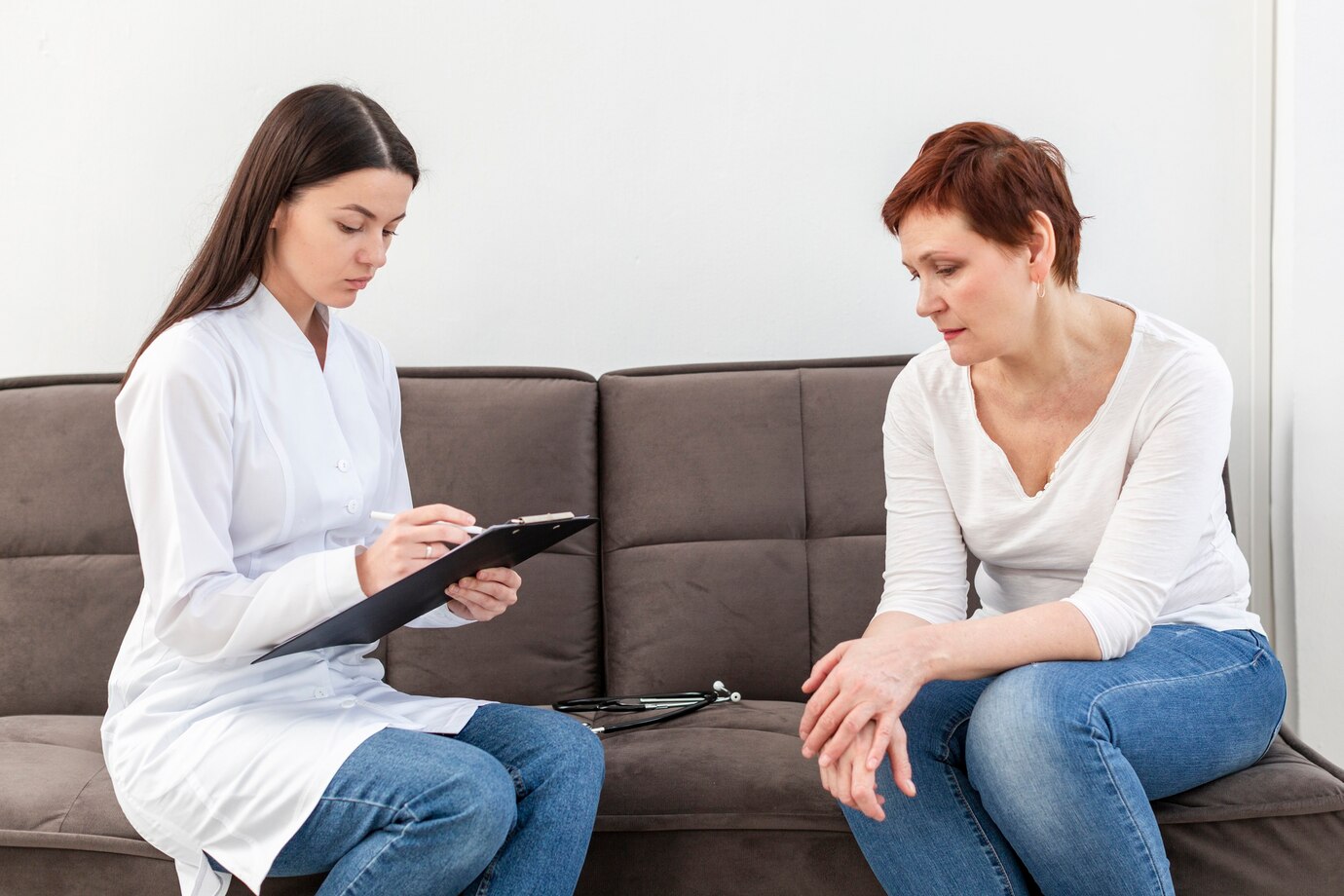 Healthcare professional consulting patient | Aesura Health